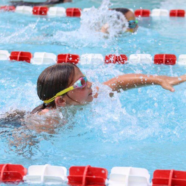 Girl swimming with goggles