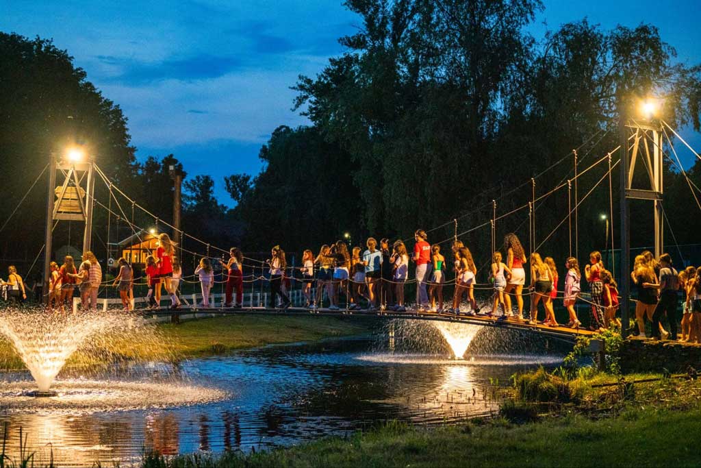Campers on bridge for evening activity.