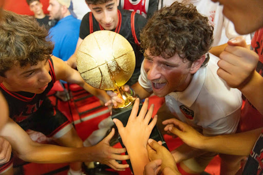 Boys celebrating their basketball win