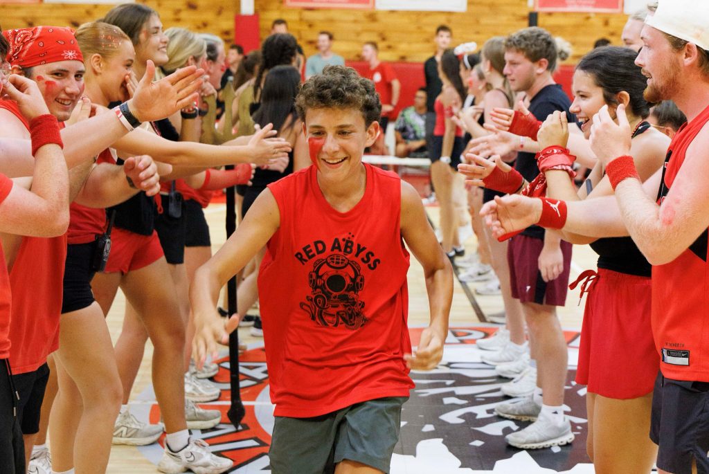 Boy with a red top representing red abyss