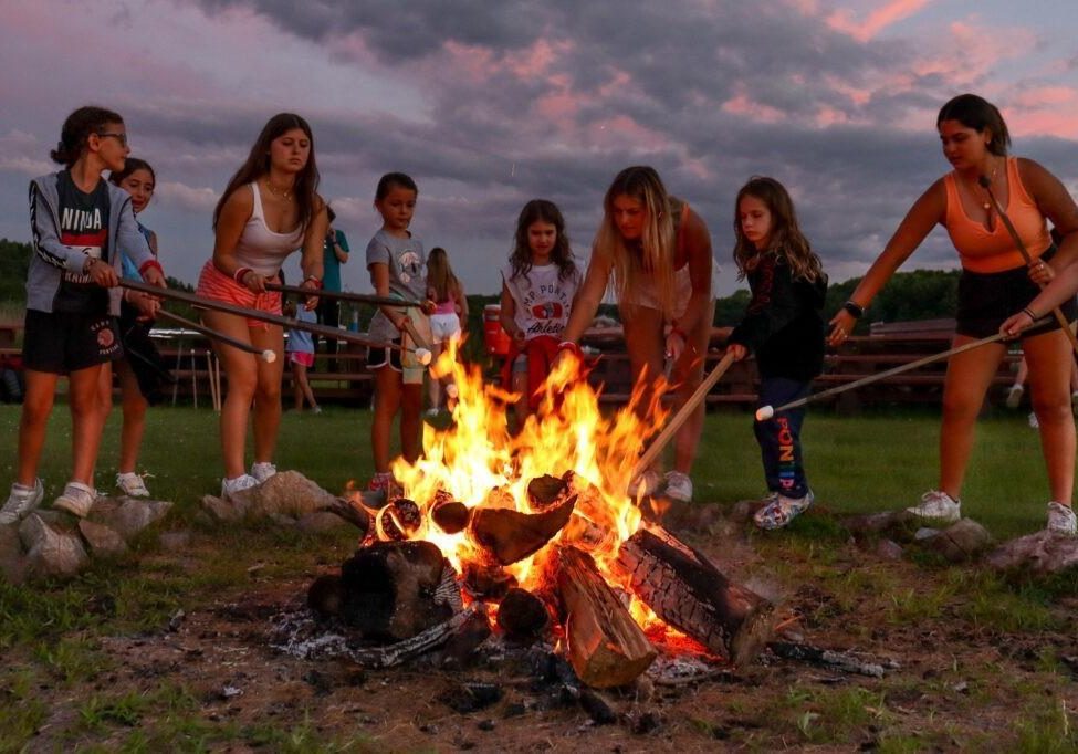 Campers around a camp fire